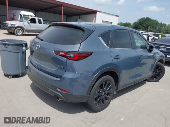 ✅ 2023 Mazda CX-5 S Carbon Edition • VIN: JM3KFBCMXP0136901 • Lot: 42630209. Listed on IAAI with 22,519 mi. Free auction sales archive from the USA and detailed vehicle history report at DreamBid. Image 4.