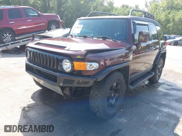 ✅ 2007 Toyota FJ Cruiser • VIN: JTEBU11F170003517 • Лот: 42981636. Опубликован ранее на IAAI с пробегом 169 928 миль. Бесплатный доступ к архиву аукционных продаж из США и подробный отчёт об истории автомобиля на DreamBid. Изображение 2.