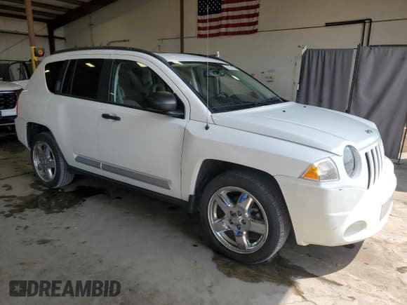 ✅ 2009 Jeep Compass • VIN: 1J8FF57B49D183513 • Lot: 69205855. Listed on Copart with 57,701 mi. Free auction sales archive from the USA and detailed vehicle history report at DreamBid. Image 4.