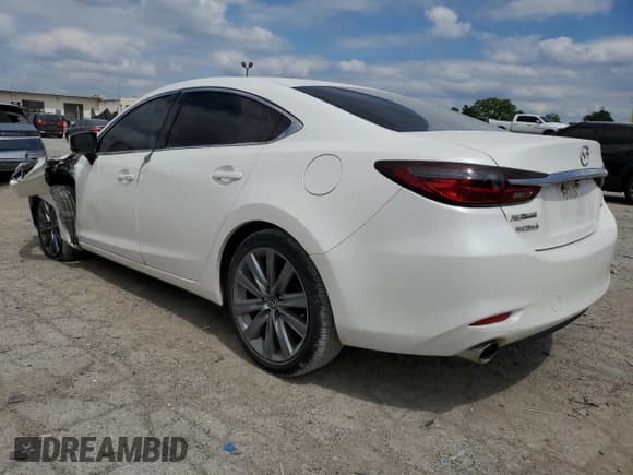 ✅ 2021 Mazda 6 Touring • VIN: JM1GL1VM3M1615598 • Лот: 70013505. Опубликован ранее на Copart с пробегом 51 640 миль. Бесплатный доступ к архиву аукционных продаж из США и подробный отчёт об истории автомобиля на DreamBid. Изображение 2.