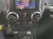 ✅ 2011 Jeep Wrangler Unlimited Sport • VIN: 1J4HA3H16BL500982 • Лот: 88174495. Опубликован ранее на Copart с пробегом 218 610 миль. Бесплатный доступ к архиву аукционных продаж из США и подробный отчёт об истории автомобиля на DreamBid. Изображение 9.