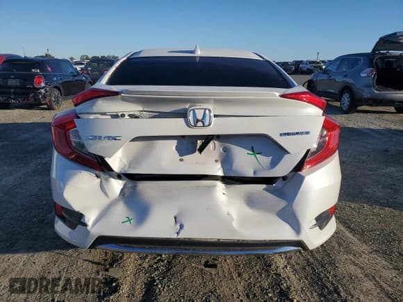 ✅ 2019 Honda Civic Touring • VIN: 19XFC1F94KE200077 • Lot: 84920195. Listed on Copart with 71,514 mi. Free auction sales archive from the USA and detailed vehicle history report at DreamBid. Image 6.