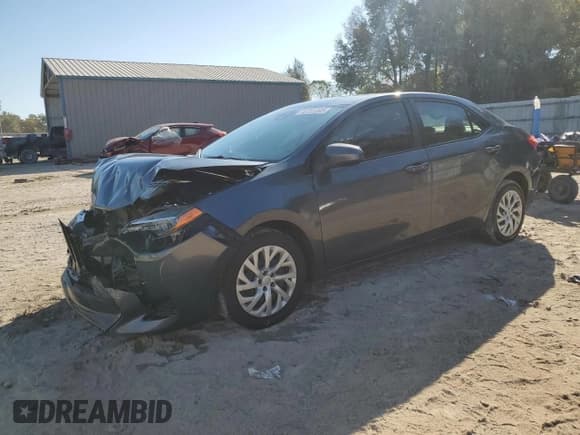 ✅ 2018 Toyota Corolla LE • VIN: 5YFBURHE7JP844822 • Lot: 92701895. Listed on Copart with 149,135 mi. Free auction sales archive from the USA and detailed vehicle history report at DreamBid. Image 1.