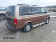 ✅ 1995 GMC Safari • VIN: 1GKDM19W1SB500991 • Lot: 41887901. Wystawiony na IAAI z przebiegiem 210 518 mil. Bezpłatny archiwum sprzedaży aukcyjnych z USA i szczegółowy raport historii pojazdu na DreamBid. Zdjęcie 4.
