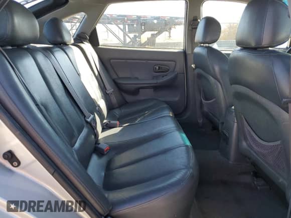 2003 Hyundai Elantra GT z VIN KMHDN55D23U097111, wystawiony jako Copart lot #79975994 z przebiegiem 111 716 mil mil oraz Czysty tytuł • Clean title. Historia ofert i sprzedaży dostępna na DreamBid. Obrazek 10.