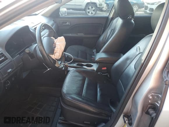 ✅ 2012 Ford Fusion SEL • VIN: 3FAHP0JA7CR316365 • Lot: 81367984. Wystawiony na Copart z przebiegiem 138 949 mil. Bezpłatny archiwum sprzedaży aukcyjnych z USA i szczegółowy raport historii pojazdu na DreamBid. Zdjęcie 7.