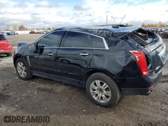 ✅ 2015 Cadillac SRX Luxury Collection • VIN: 3GYFNEE3XFS612665 • Lot: 89852585. Listed on Copart with 121,485 mi. Free auction sales archive from the USA and detailed vehicle history report at DreamBid. Image 2.