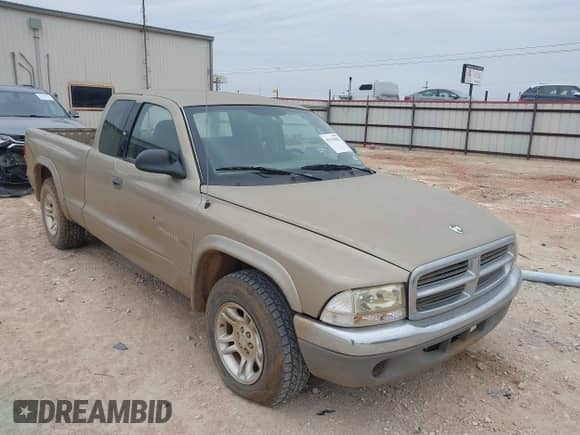 2002 Dodge Dakota SLT с VIN 1B7GL42N42S570015, выставлен на аукционе IAAI как лот 41339483 с пробегом 122 182 миль миль и . История ставок и продаж доступна на DreamBid. Изображение 1.