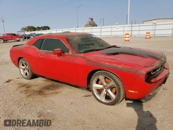 2009 Dodge Challenger SRT-8 z VIN 2B3LJ74W29H569671, wystawiony jako Copart lot #71186264 z przebiegiem Nie podano mil oraz Szkoda całkowita • Salvage title. Historia ofert i sprzedaży dostępna na DreamBid. Obrazek 4.