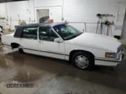 ✅ 1992 Cadillac DeVille • VIN: 1G6CD53B9N4210496 • Lot: 85325204. Listed on Copart with 148,360 mi. Free auction sales archive from the USA and detailed vehicle history report at DreamBid. Image 4.