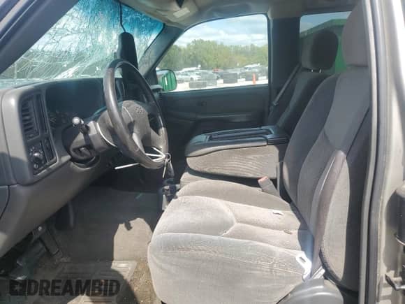 2003 Chevrolet Silverado 1500 LS with VIN 2GCEC19T231258044, listed as a Copart auction lot 84606025 with 174,012 mi miles and Salvage title. Bid and sale history available at DreamBid. Image 7.