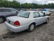 ✅ 2000 Ford Crown Victoria • VIN: 2FAFP73W6YX117101 • Lot: 66004304. Wystawiony na Copart z przebiegiem 124 011 mil. Bezpłatny archiwum sprzedaży aukcyjnych z USA i szczegółowy raport historii pojazdu na DreamBid. Zdjęcie 3.
