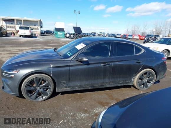✅ 2023 Genesis G70 2.0T • VIN: KMTG34TA9PU109174 • Lot: 41582887. Listed on IAAI with 72,996 mi. Free auction sales archive from the USA and detailed vehicle history report at DreamBid. Image 14.