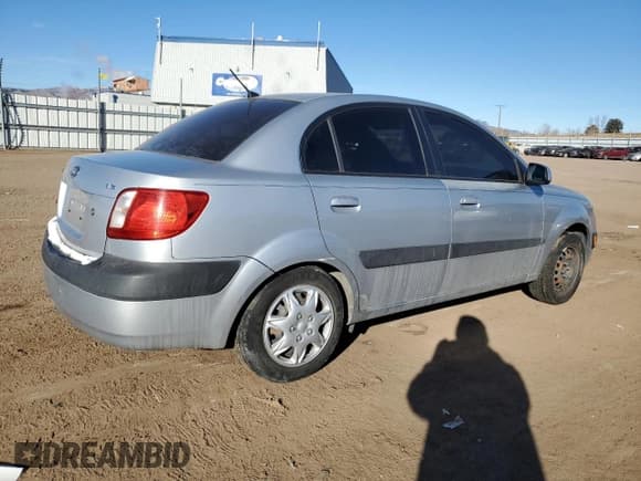 ✅ 2007 Kia Rio LX • VIN: KNADE123476205938 • Lot: 88741915. Listed on Copart with 125,468 mi. Free auction sales archive from the USA and detailed vehicle history report at DreamBid. Image 3.