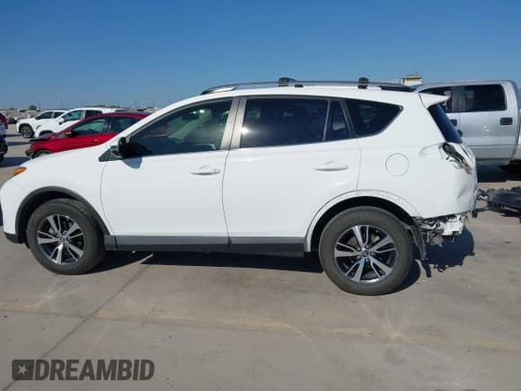 ✅ 2018 Toyota RAV4 XLE • VIN: JTMWFREV2JD132897 • Lot: 43310664. Listed on IAAI with 96,612 mi. Free auction sales archive from the USA and detailed vehicle history report at DreamBid. Image 15.
