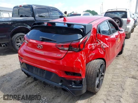 2020 Hyundai Veloster z VIN KMHT36AH0LU004909, wystawiony jako IAAI lot #42657127 z przebiegiem 86 557 mil mil oraz . Historia ofert i sprzedaży dostępna na DreamBid. Obrazek 4.