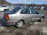 2003 Hyundai Accent GL with VIN KMHCG45C33U469496, listed as a Copart auction lot 45926595 with 77,737 mi miles and Salvage title. Bid and sale history available at DreamBid. Image 3.