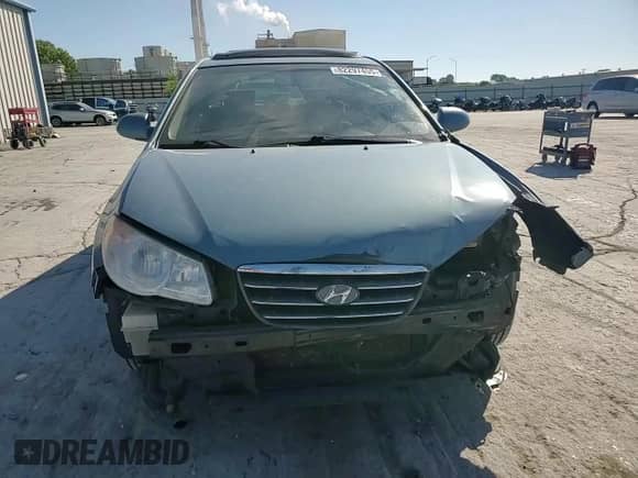 2007 Hyundai Elantra GLS z VIN KMHDU46D27U210878, wystawiony jako Copart lot #82297455 z przebiegiem 163 980 mil mil oraz Szkoda całkowita • Salvage title. Historia ofert i sprzedaży dostępna na DreamBid. Obrazek 14.