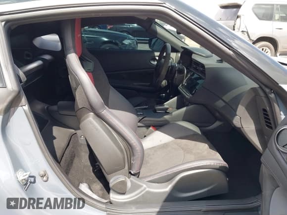 ✅ 2024 Nissan Z Nismo • VIN: JN1BZ4CH7RM360818 • Lot: 42733312. Listed on IAAI with 3,306 mi. Free auction sales archive from the USA and detailed vehicle history report at DreamBid. Image 5.