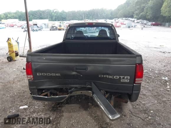 2003 Dodge Dakota SLT with VIN 1D7HL42X03S238022, listed as a IAAI auction lot 42712721 with 122,865 mi miles and . Bid and sale history available at DreamBid. Image 16.