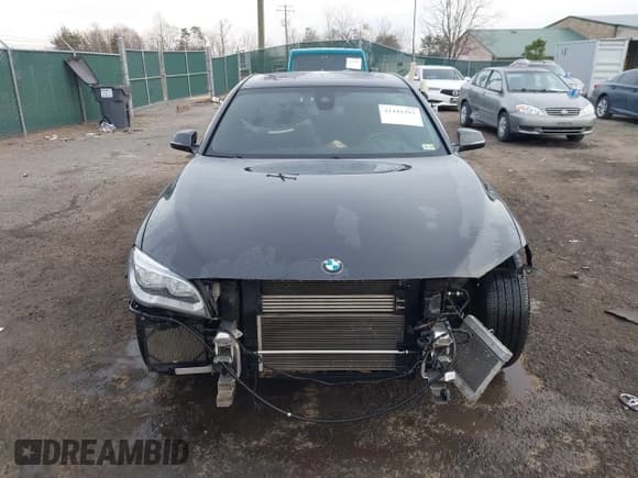 ✅ 2015 BMW 7 Series 750i xDrive • VIN: WBAYB6C56FG299238 • Lot: 41441393. Listed on IAAI with 62,396 mi. Free auction sales archive from the USA and detailed vehicle history report at DreamBid. Image 6.