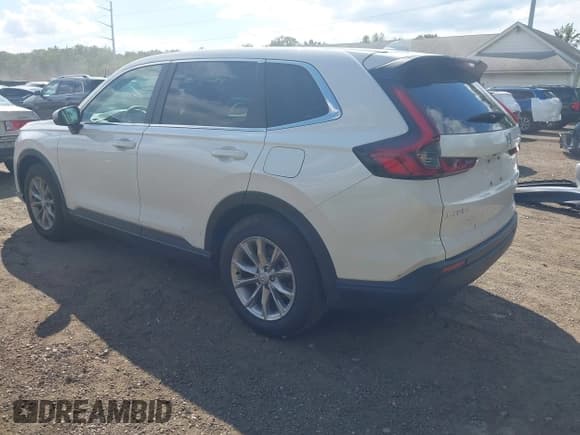✅ 2025 Honda CR-V EX-L • VIN: 2HKRS4H76SH455922 • Lot: 43054441. Listed on IAAI with 7,461 mi. Free auction sales archive from the USA and detailed vehicle history report at DreamBid. Image 3.