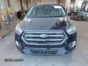 ✅ 2017 Ford Escape Titanium • VIN: 1FMCU0JD4HUA37751 • Lot: 43781731. Wystawiony na IAAI z przebiegiem 110 786 mil. Bezpłatny archiwum sprzedaży aukcyjnych z USA i szczegółowy raport historii pojazdu na DreamBid. Zdjęcie 6.