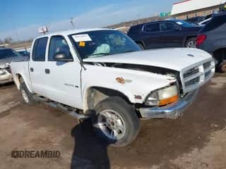 2000 Dodge Dakota Sport z VIN 1B7GL2AN5YS695474, wystawiony jako IAAI lot #38624575 z przebiegiem 94 328 mil mil oraz . Historia ofert i sprzedaży dostępna na DreamBid. Obrazek 1.