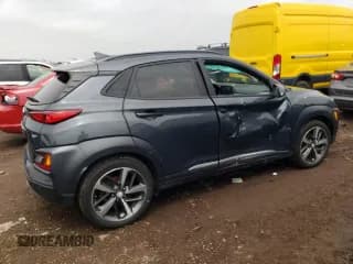 ✅ 2020 Hyundai Kona Ultimate • VIN: KM8K53A59LU429958 • Лот: 54653084. Опубликован ранее на Copart с пробегом 27 298 миль. Бесплатный доступ к архиву аукционных продаж из США и подробный отчёт об истории автомобиля на DreamBid. Изображение 3.