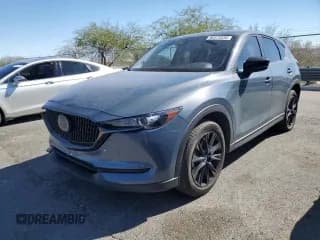 ✅ 2021 Mazda CX-5 Carbon Edition • VIN: JM3KFBCY8M0457706 • Lot: 90372035. Listed on Copart with 38,185 mi. Free auction sales archive from the USA and detailed vehicle history report at DreamBid. Image 1.