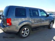 ✅ 2012 Honda Pilot EX-L • VIN: 5FNYF3H62CB022552 • Lot: 43556702. Listed on IAAI with 213,233 mi. Free auction sales archive from the USA and detailed vehicle history report at DreamBid. Image 13.