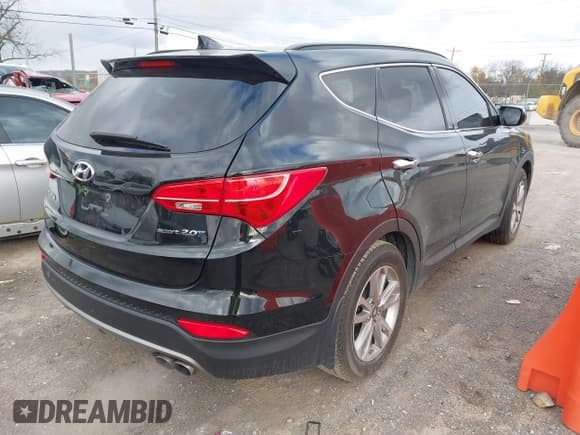 ✅ 2015 Hyundai Santa Fe • VIN: 5XYZU3LA4FG295401 • Лот: 43661856. Опубликован ранее на IAAI с пробегом 103 839 миль. Бесплатный доступ к архиву аукционных продаж из США и подробный отчёт об истории автомобиля на DreamBid. Изображение 4.