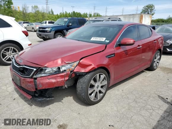 ✅ 2012 Kia Optima SX • VIN: 5XXGR4A64CG070859 • Лот: 67184165. Опубликован ранее на Copart с пробегом 170 772 миль. Бесплатный доступ к архиву аукционных продаж из США и подробный отчёт об истории автомобиля на DreamBid. Изображение 1.