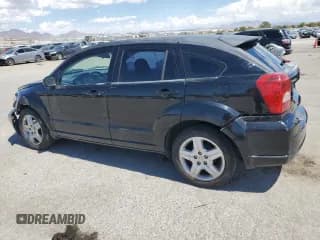 ✅ 2009 Dodge Caliber SXT • VIN: 1B3HB48A29D103266 • Лот: 68567414. Опубликован ранее на Copart с пробегом 98 633 миль. Бесплатный доступ к архиву аукционных продаж из США и подробный отчёт об истории автомобиля на DreamBid. Изображение 2.