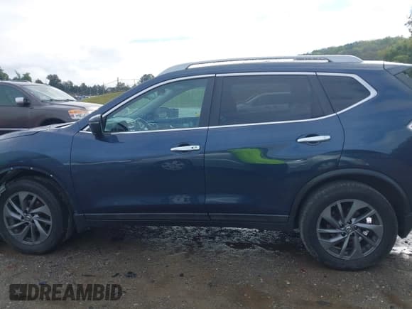 ✅ 2016 Nissan Rogue SL • VIN: 5N1AT2MV8GC892144 • Lot: 43290093. Listed on IAAI with 140,411 mi. Free auction sales archive from the USA and detailed vehicle history report at DreamBid. Image 14.