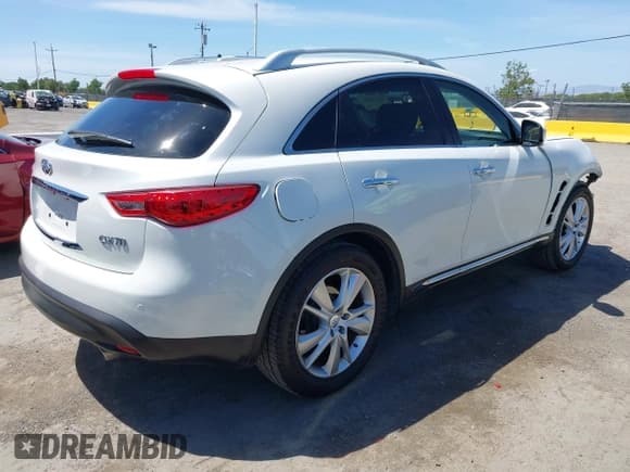 ✅ 2014 Infiniti QX70 • VIN: JN8CS1MW6EM411872 • Lot: 42271036. Wystawiony na IAAI z przebiegiem 120 891 mil. Bezpłatny archiwum sprzedaży aukcyjnych z USA i szczegółowy raport historii pojazdu na DreamBid. Zdjęcie 4.