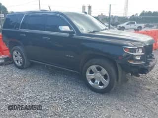 2015 Chevrolet Tahoe LTZ z VIN 1GNSCCKC8FR121461, wystawiony jako IAAI lot #42407901 z przebiegiem 137 729 mil mil oraz . Historia ofert i sprzedaży dostępna na DreamBid. Obrazek 1.