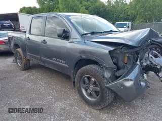 ✅ 2014 Nissan Titan Pro-4X • VIN: 1N6BA0EC4EN509573 • Lot: 42483485. Listed on IAAI with 258,346 mi. Free auction sales archive from the USA and detailed vehicle history report at DreamBid. Image 1.