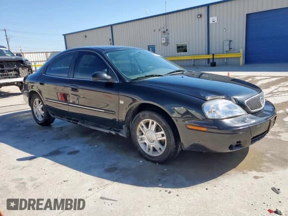 ✅ 2005 Mercury Sable LS • VIN: 1MEFM55S25A611010 • Лот: 81436125. Опубликован ранее на Copart с пробегом 220 284 миль. Бесплатный доступ к архиву аукционных продаж из США и подробный отчёт об истории автомобиля на DreamBid. Изображение 4.