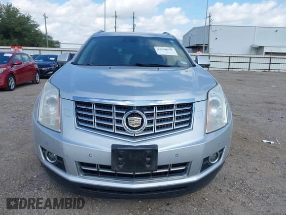 ✅ 2013 Cadillac SRX Performance Collection • VIN: 3GYFNDE30DS513053 • Lot: 43530295. Listed on IAAI with 124,178 mi. Free auction sales archive from the USA and detailed vehicle history report at DreamBid. Image 13.