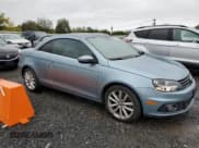 ✅ 2012 Volkswagen Eos Komfort • VIN: WVWBW7AH4CV011627 • Lot: 84918185. Listed on Copart with 96,247 mi. Free auction sales archive from the USA and detailed vehicle history report at DreamBid. Image 4.