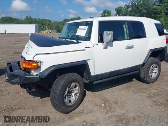 ✅ 2012 Toyota FJ Cruiser • VIN: JTEBU4BF4CK135430 • Lot: 42822580. Listed on IAAI with 178,198 mi. Free auction sales archive from the USA and detailed vehicle history report at DreamBid. Image 2.