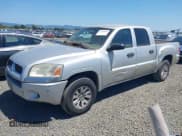 ✅ 2006 Mitsubishi Raider LS • VIN: 1Z7HC28K66S561607 • Лот: 42348069. Опубликован ранее на IAAI с пробегом 162 231 миль. Бесплатный доступ к архиву аукционных продаж из США и подробный отчёт об истории автомобиля на DreamBid. Изображение 2.