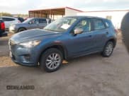 ✅ 2016 Mazda CX-5 Sport • VIN: JM3KE4BY4G0660953 • Лот: 43450266. Опубликован ранее на IAAI с пробегом 140 627 миль. Бесплатный доступ к архиву аукционных продаж из США и подробный отчёт об истории автомобиля на DreamBid. Изображение 2.