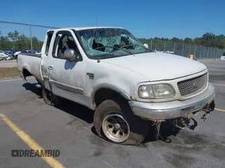 ✅ 2000 Ford F-150 XL • VIN: 1FTRX18L7YNB61953 • Lot: 43365381. Listed on IAAI with 358,133 mi. Free auction sales archive from the USA and detailed vehicle history report at DreamBid. Image 1.