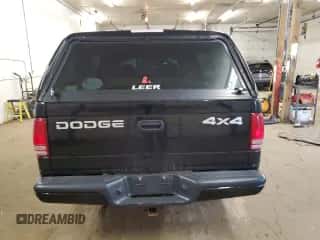 2002 Dodge Dakota Sport z VIN 1B7GG32N92S563589, wystawiony jako Copart lot #79580194 z przebiegiem 110 736 mil mil oraz Czysty tytuł • Clean title. Historia ofert i sprzedaży dostępna na DreamBid. Obrazek 6.