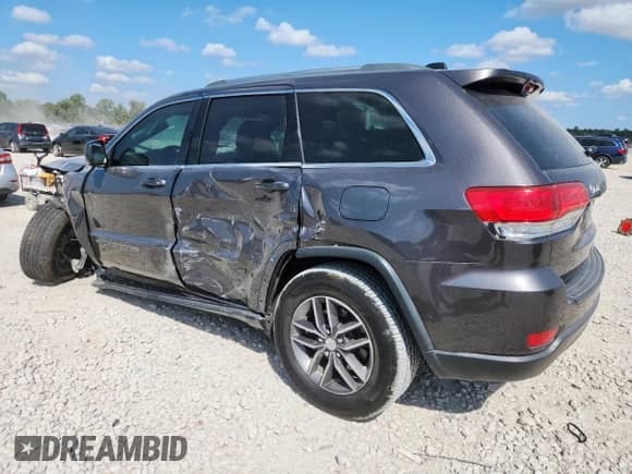 2018 Jeep Grand Cherokee Laredo E with VIN 1C4RJEAG6JC429690, listed as a Copart auction lot 81669685 with 82,876 mi miles and Salvage title. Bid and sale history available at DreamBid. Image 2.