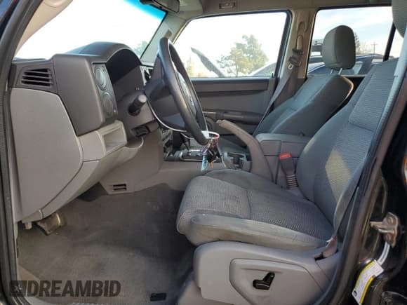 ✅ 2007 Jeep Commander Sport • VIN: 1J8HH48K57C587581 • Лот: 80295183. Опубликован ранее на Copart с пробегом 230 660 миль. Бесплатный доступ к архиву аукционных продаж из США и подробный отчёт об истории автомобиля на DreamBid. Изображение 7.