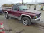 2000 Dodge Dakota Sport z VIN 1B7GG26N8YS795890, wystawiony jako Copart lot #78523764 z przebiegiem 214 933 mil mil oraz Szkoda całkowita • Salvage title. Historia ofert i sprzedaży dostępna na DreamBid. Obrazek 4.