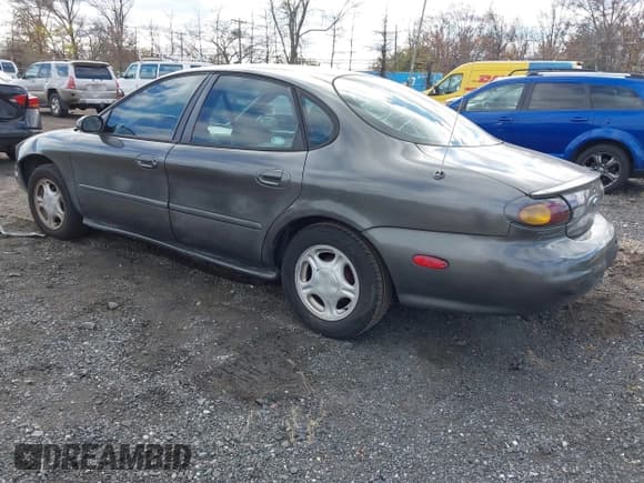 ✅ 1996 Ford Taurus GL • VIN: 1FALP52U9TA199317 • Lot: 43694961. Wystawiony na IAAI z przebiegiem 99 130 mil. Bezpłatny archiwum sprzedaży aukcyjnych z USA i szczegółowy raport historii pojazdu na DreamBid. Zdjęcie 3.